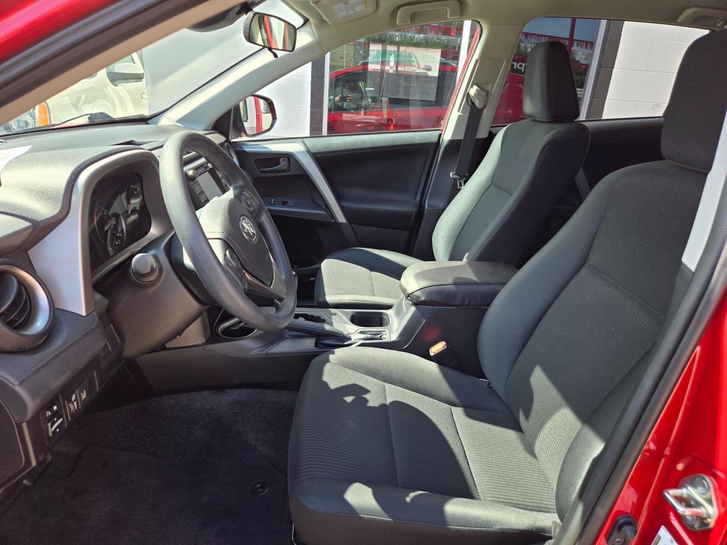 2017 Red Toyota RAV4 LE FWD (2T3ZFREV9HW) with an 2.5L L4 DOHC 16V engine, 6A transmission, located at 503 West Court, Seguin, TX, 78155, (830) 379-3373, 29.568621, -97.969803 - Photo#4